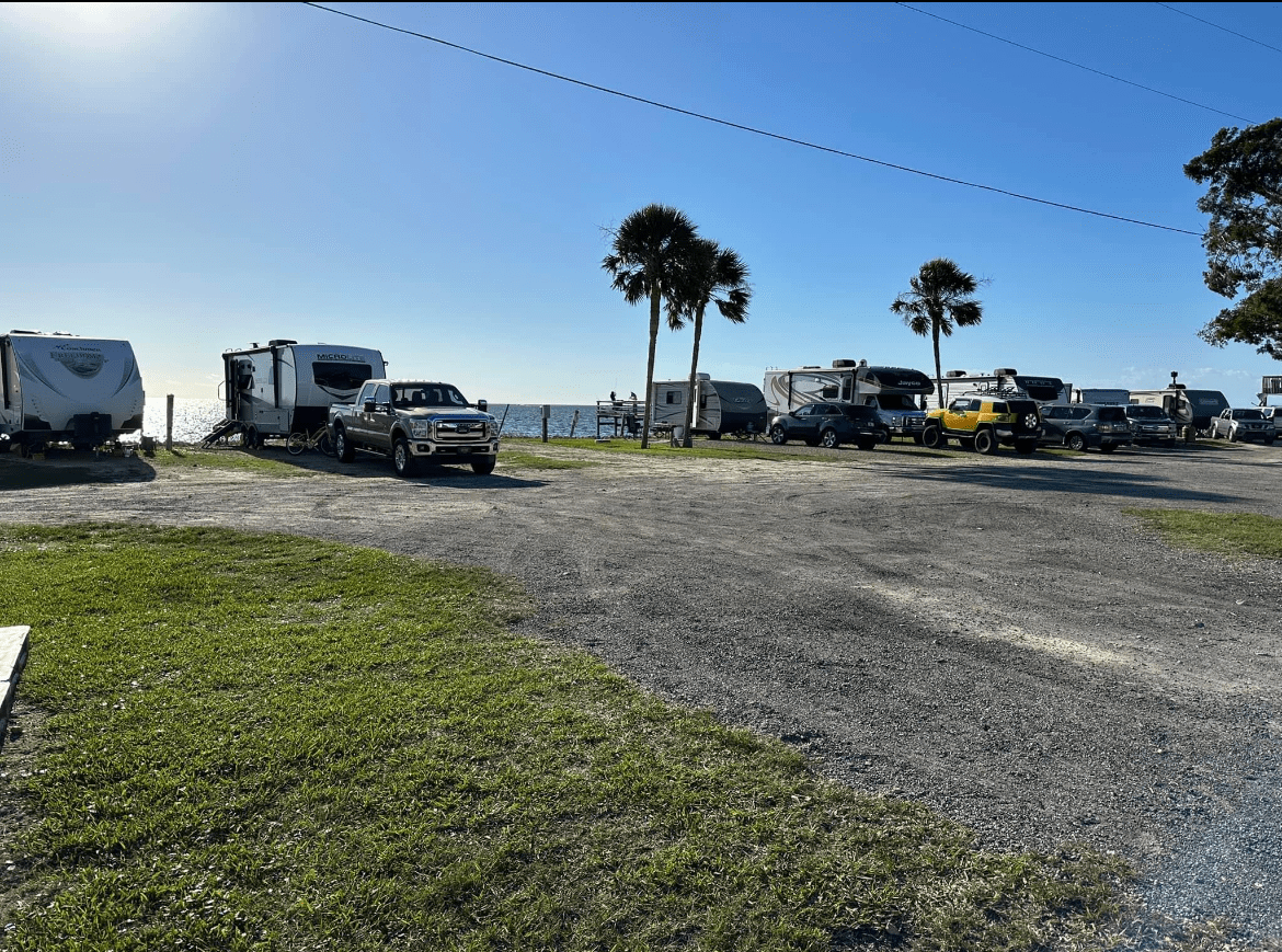 A Group of Vehicles Parked in a Parking Lot